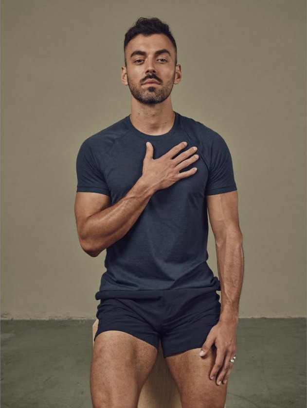 Man practicing seated box breathing, representing deliberate self-regulation practice